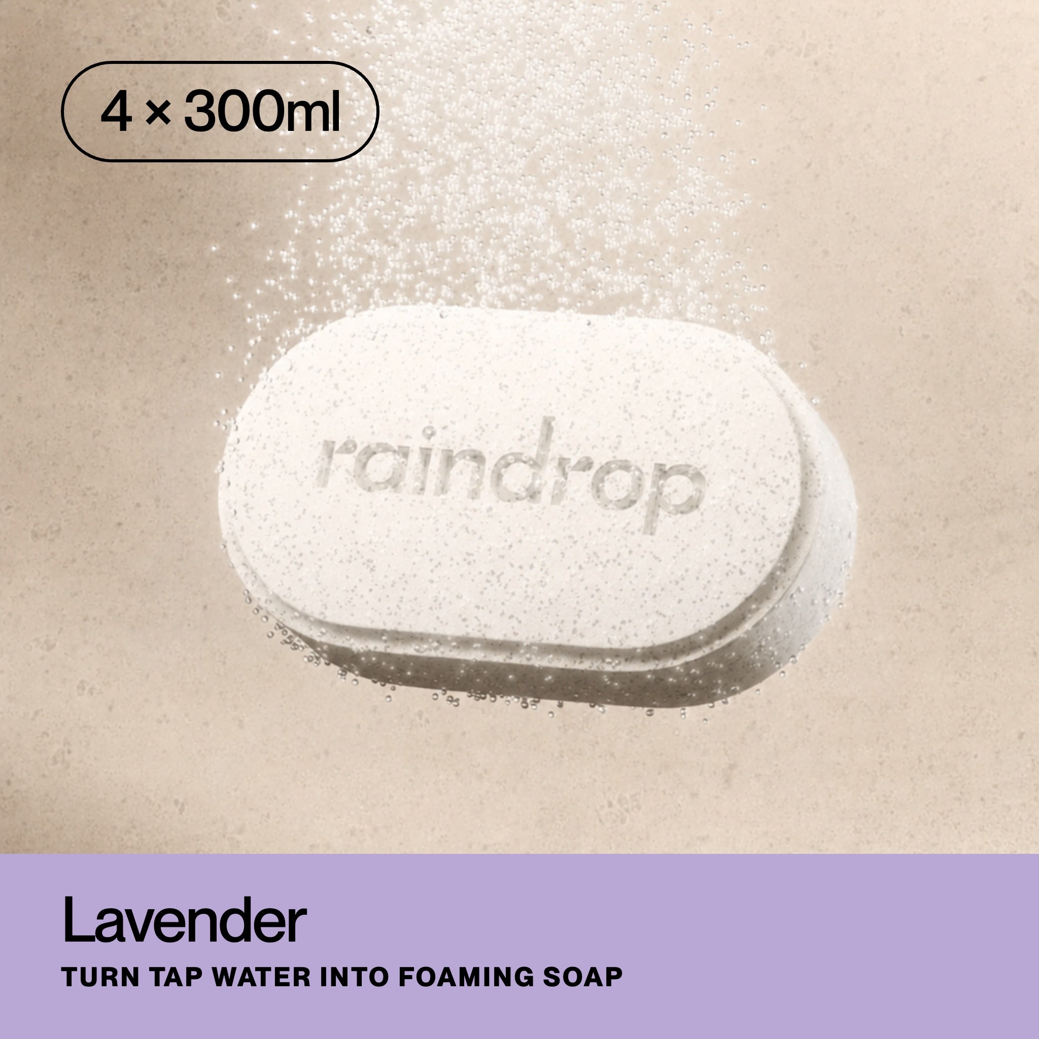 A single oval Rndrp foaming soap refill tablet shown partially dissolving in water - ready to make thick, foaming soap.